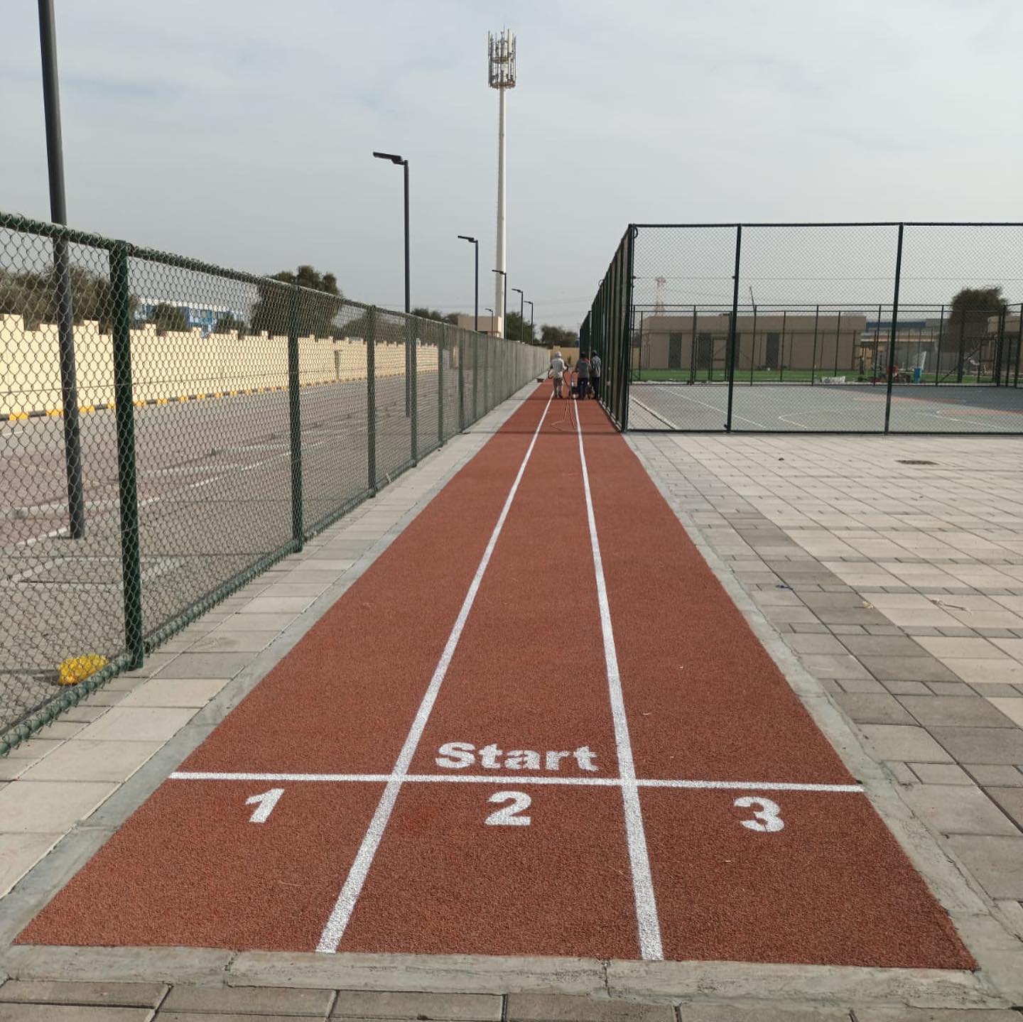 STANDARD RUNNING TRACK AT SCHOOL