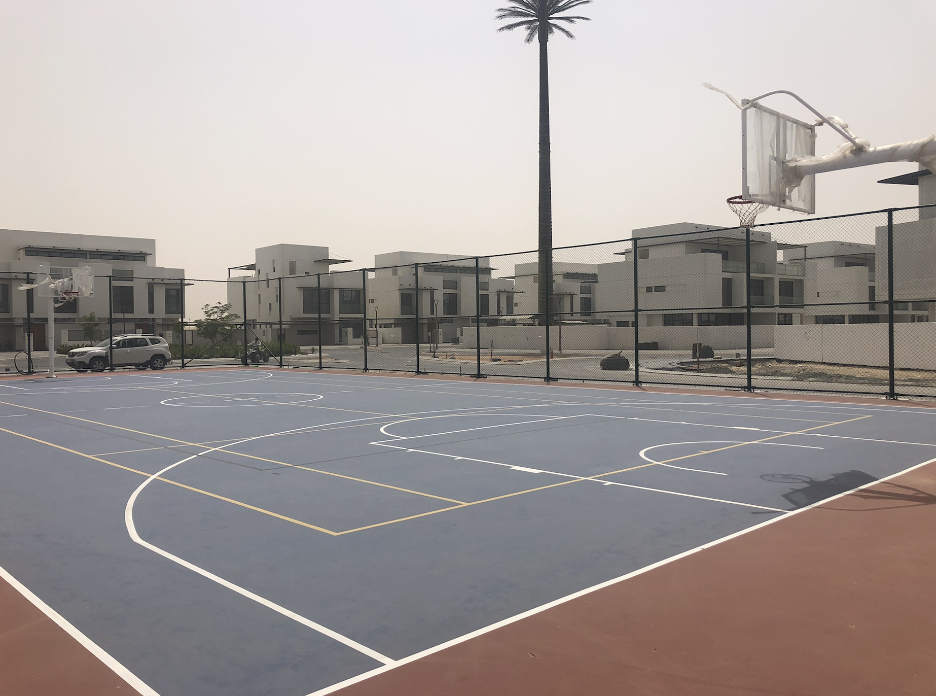 Multipurpose flooring with fixed Basketball post